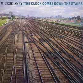 Microdisney - The Clock Comes Down The Stairs